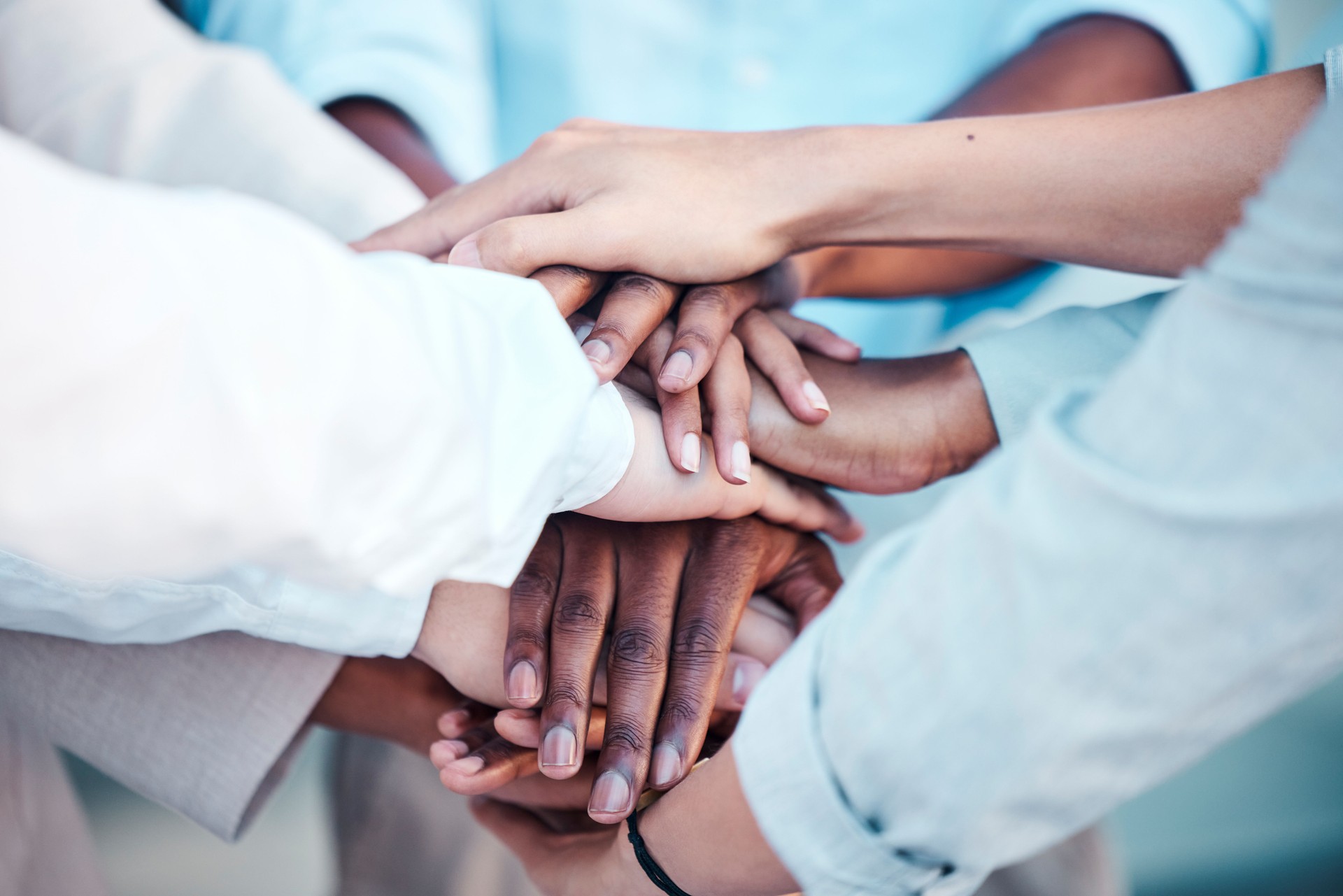 Diversity, business and hands together, for collaboration and support for group project. Closeup, partnership or solidarity for teamwork, team building or commitment for cooperation for planning